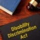 Disability discrimination law book on a desk.