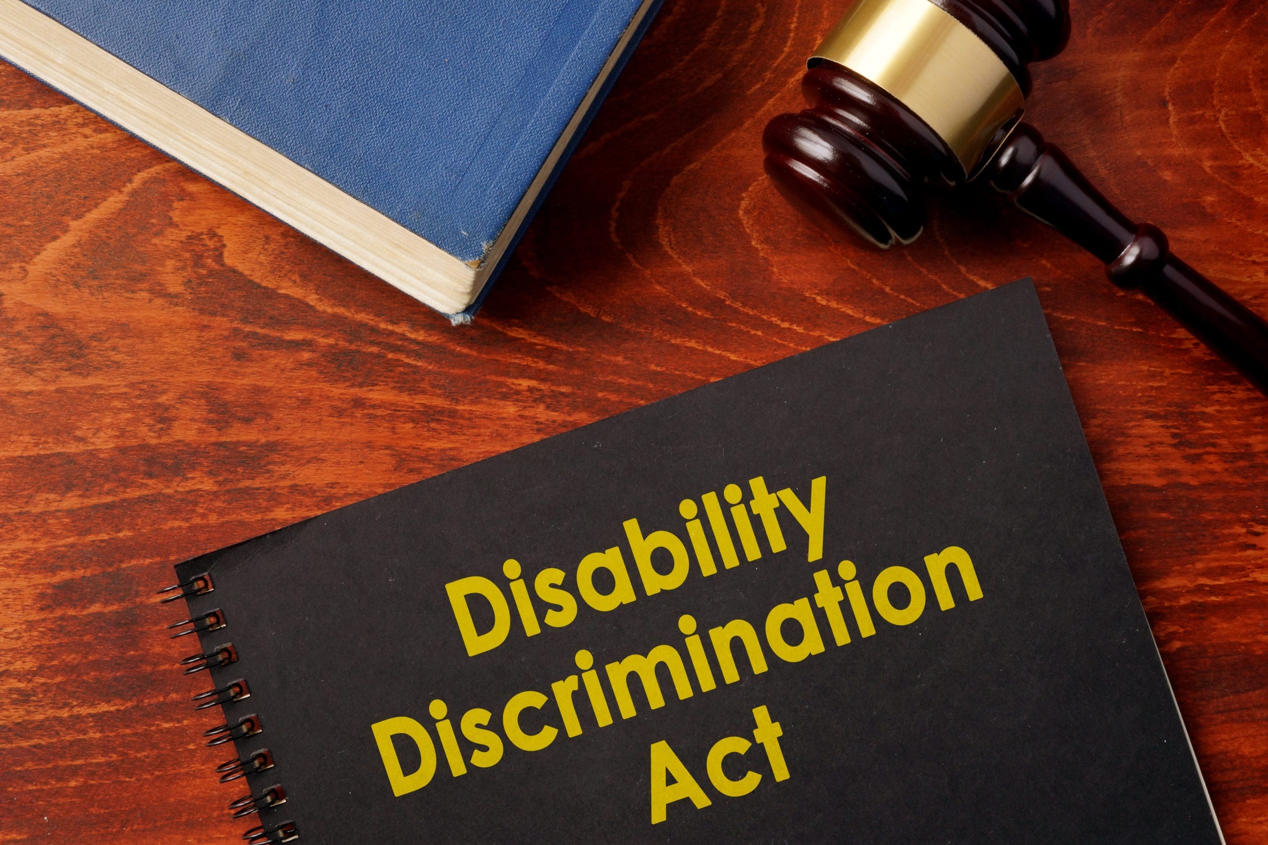 Disability discrimination law book on a desk.