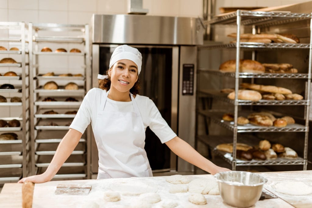 A baker standing at a table in Bakery is a food service employee likely covered by the FSMA's Whistleblower Protections and Illinois whistleblower laws.